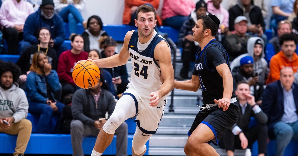Top-Ranked Men's Hoops Cruises Past Regis Thursday, 86-49