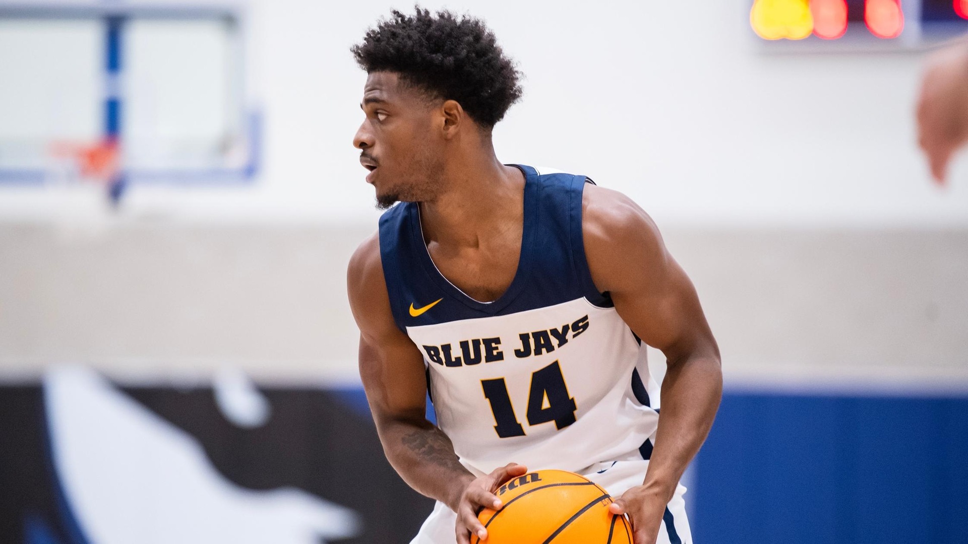 No. 13 Men's Hoops Holds Off No. 21 Illinois Wesleyan in OT, 73-64