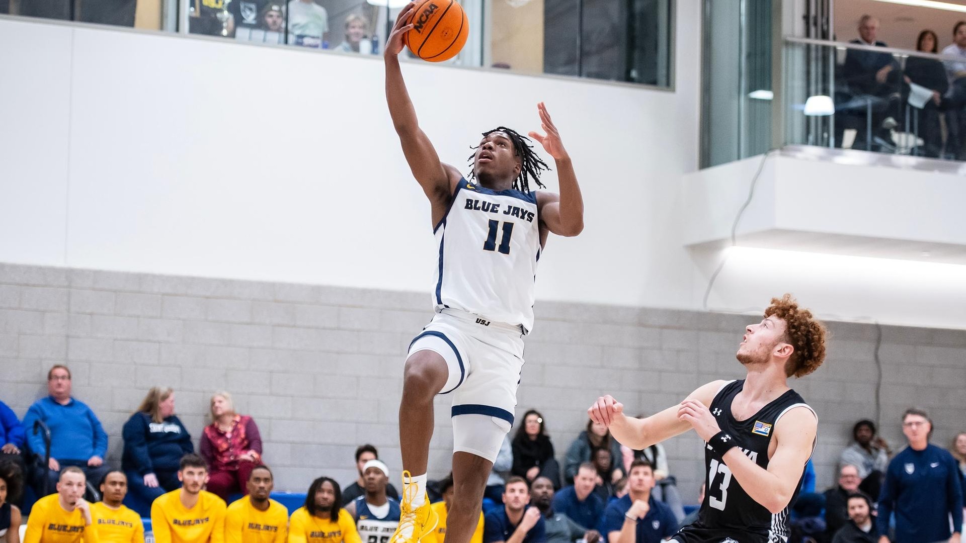 Men's Hoops Remains Perfect in GNAC Play, Tops Rival Albertus Magnus, 100-86