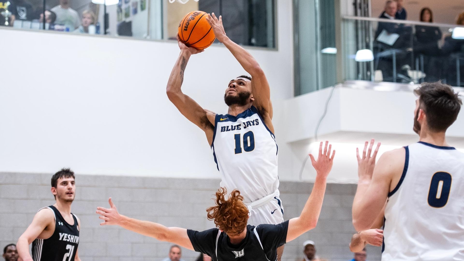 Men's Hoops Closes Out Colby in Opening Game of Lafrance Hospitality Classic Friday, 79-70