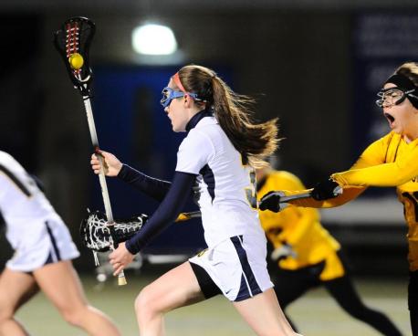 Foster Scores Record Seven Goals in Lax Win